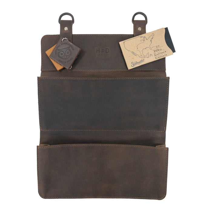 Hide & Drink Double Document Holder for Hanging styled with cards, showcasing its functionality for wall mount file storage. Made of durable full grain leather, this piece embodies artisan craftsmanship, small batch production, hand cut, hand sewn, and fire branded, proudly handmade in La Antigua Guatemala & Oaxaca Mexico.