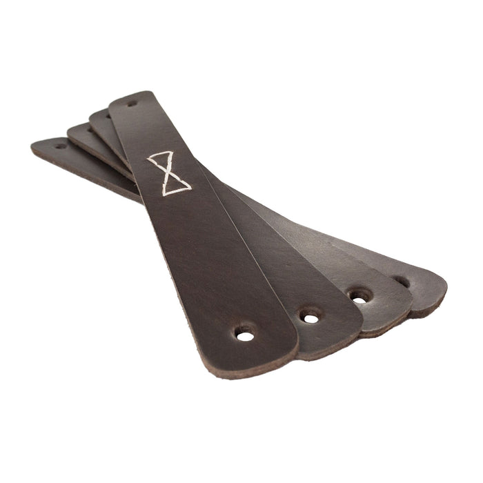 A collection of four Rectangular Drawer Handles with Bowtie Stitching Design, highlighting the exquisite quality of full grain leather. Made by Hide & Drink, this 4 Pack showcases handcrafted beauty and artisan work from La Antigua Guatemala & Oaxaca Mexico.