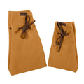 Showcasing a unique hue of Hide & Drink's Drawstring Sack (2 pack) made from exquisite sheepskin leather, highlighting its versatility. Drawstring Sack (2 pack) Handmade from Sheepskin and Full Grain Leather, StockyardX, Small Batch Production, Hand Cut, Hand Sewn, Fire Branded, Artisan, Handmade in La Antigua Guatemala & Oaxaca Mexico.