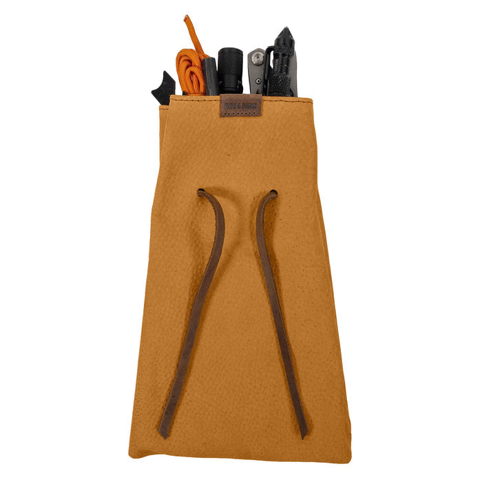 A beautifully structured Hide & Drink's Drawstring Sack (2 pack) highlighting both form and function for secure storage. Drawstring Sack (2 pack) Handmade from Sheepskin and Full Grain Leather, StockyardX, Small Batch Production, Hand Cut, Hand Sewn, Fire Branded, Artisan, Handmade in La Antigua Guatemala & Oaxaca Mexico.