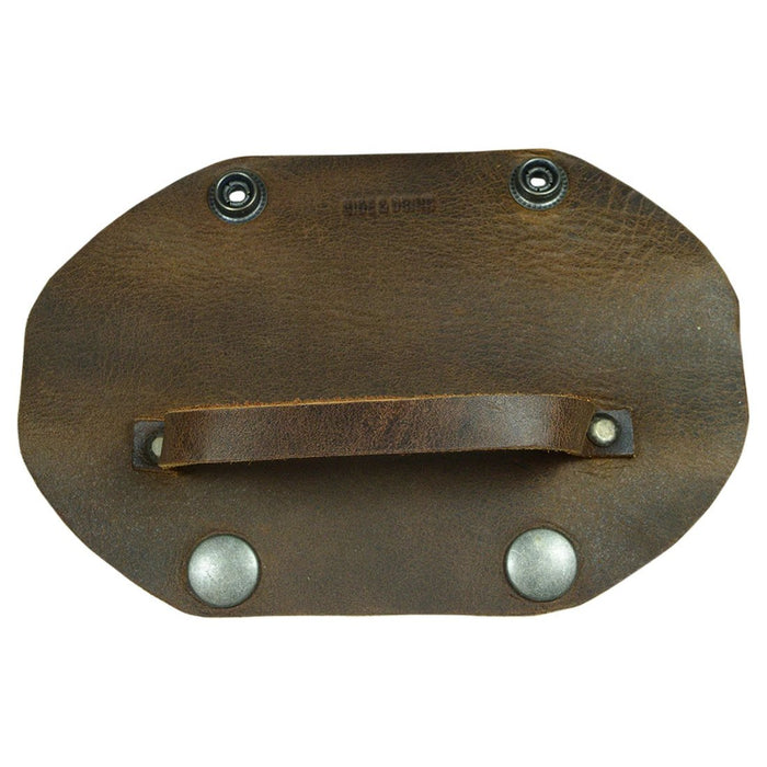 The underside of the Hide & Drink Drumstick Holder reveals its sturdy construction and unique design. This essential Organizer Case for drummers is made from Full Grain Leather, showcasing the Artisan craftsmanship that goes into each piece. A perfect addition for anyone looking for quality handmade products from La Antigua Guatemala & Oaxaca Mexico.