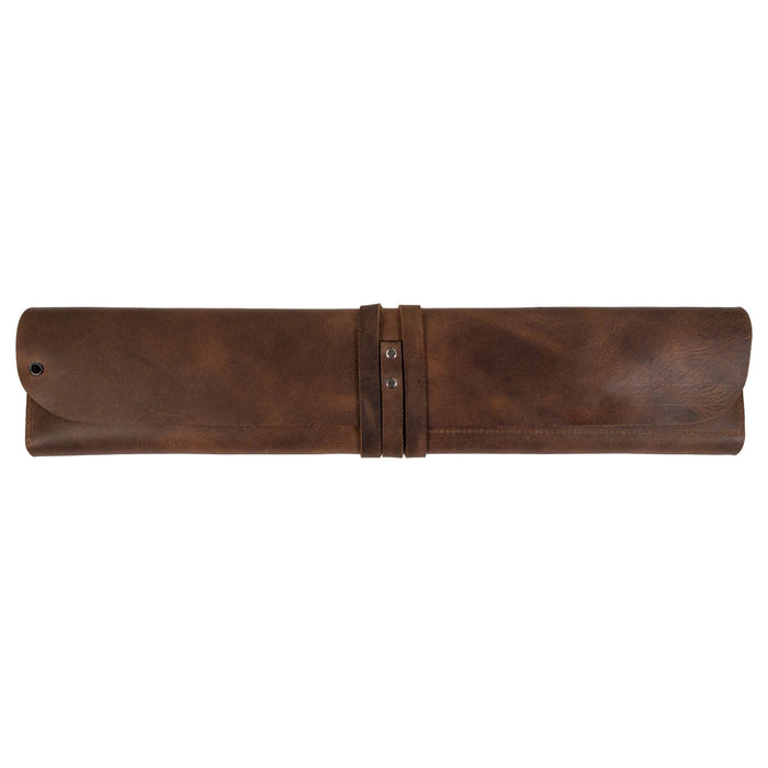 Hide & Drink’s Drumstick Roll with Slot for Drum Key made from Full Grain Leather showcases a sleek design, perfect for drummers seeking style and functionality. This artisan piece reflects small batch production, hand cut and hand sewn craftsmanship, infused with fire branded details, all handmade in La Antigua Guatemala & Oaxaca Mexico.