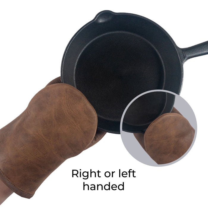 Cast Leather Co. Dual-Hand Leather Oven Mitt in action, highlighted as a right or left-handed oven glove for versatile cooking. This heat-resistant kitchen essential is crafted from Full Grain Leather, designed for baking and cooking enthusiasts with an artisan touch, handmade in La Antigua Guatemala & Oaxaca Mexico.