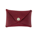 Hide & Drink Envelope Coin Case in burgundy leather, showcasing a rustic and stylish design. This artisan-crafted item is made from full grain leather, highlighting small batch production techniques in La Antigua Guatemala & Oaxaca Mexico.
