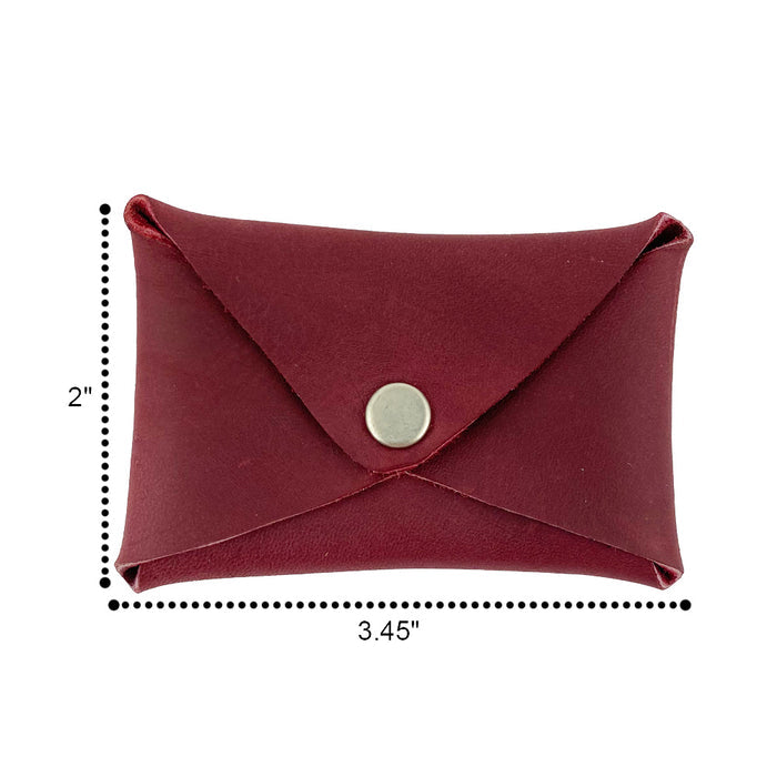 Stylish Envelope Coin Case by Hide & Drink, featuring rustic leather and a compact, envelope-shaped design. Perfect for storing loose change with its durable full grain leather craftsmanship. This small batch production item is hand cut, hand sewn, and fire branded, showcasing artisan quality handmade in La Antigua Guatemala & Oaxaca Mexico. Ideal gift idea for car enthusiasts looking for a stylish secret bag miniature world for coins.