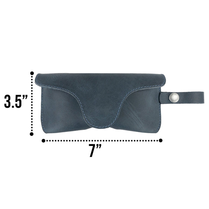 Closed dark blue Eyeglasses Case with Strap from Hide & Drink, providing an elegant solution for storing sunglasses. Made from high-quality full grain leather, this protector for eyewear reflects artisan quality from La Antigua Guatemala & Oaxaca Mexico.
