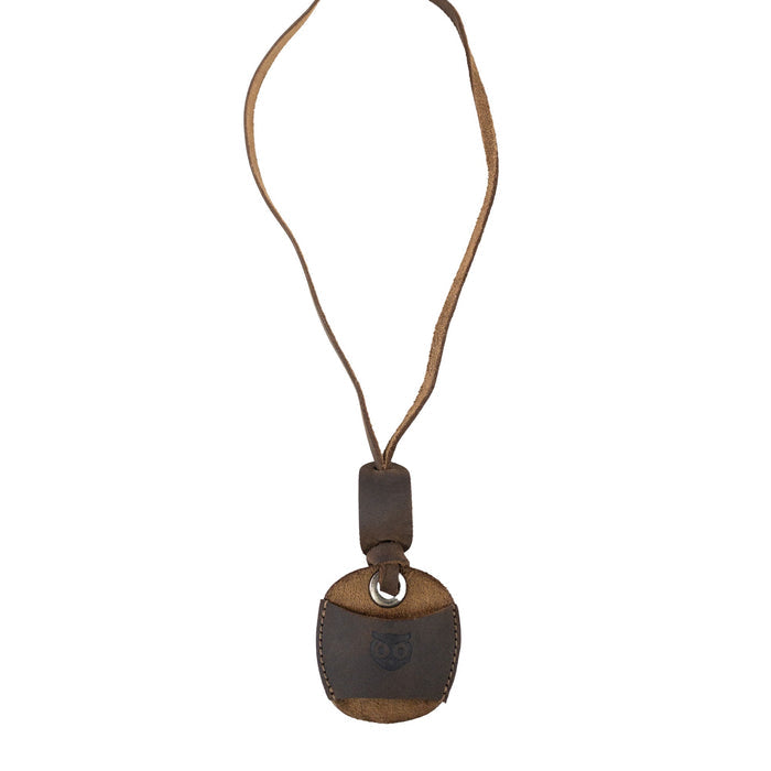 Hide & Drink Eyeglasses Holder displayed with leather neck strap, designed for easy access. This Eyeglasses Holder is crafted from full grain leather, perfect for keeping sunglasses and reading glasses secure. Small batch production, artisan craftsmanship in La Antigua Guatemala & Oaxaca Mexico.