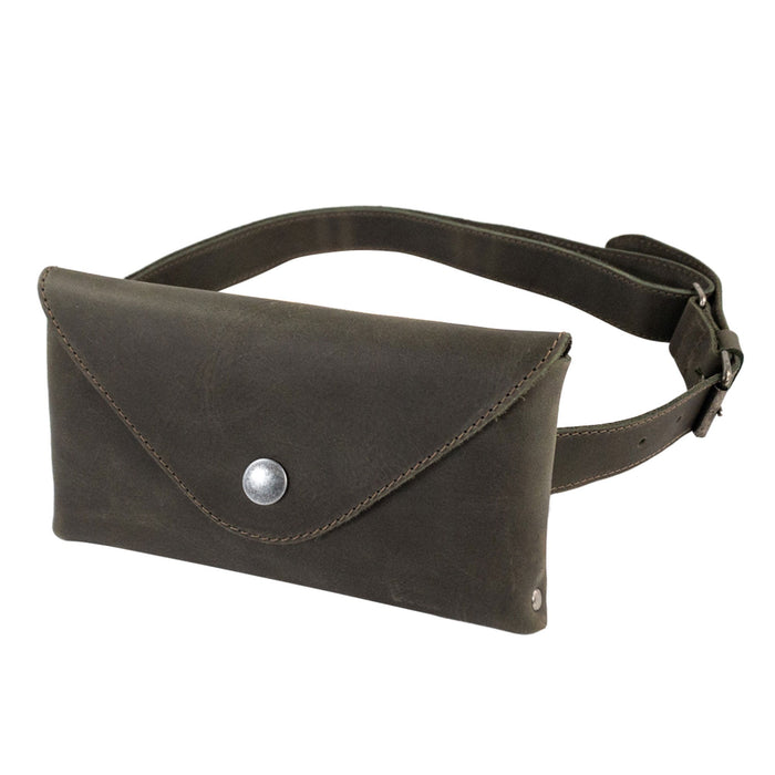 Hide & Drink's Fancy Fanny Pack in a multi-brown tone, designed for both fashion and function. This full grain leather waist pouch is ideal for storing essentials while traveling, handcrafted in small batches in La Antigua Guatemala.