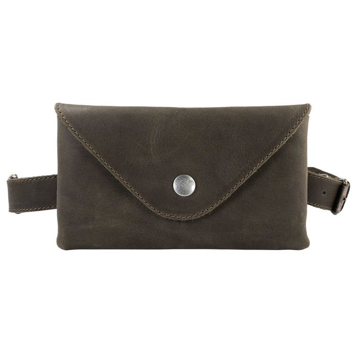 Sophisticated brown Fancy Fanny Pack by Hide & Drink, crafted from full grain leather. This artisan waist pouch offers vintage charm and is perfect for easy travel needs or as a stylish phone holder.