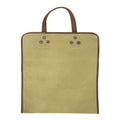 Hide & Drink Firewood Bag displayed from the front, showcasing its robust design and leather detailing, perfect for adding a rustic touch to any home. Firewood Bag With Leather Liner, Full Grain Leather, StockyardX, Small Batch Production, Hand Cut, Hand Sewn, Fire Branded, Artisan, Handmade in La Antigua Guatemala & Oaxaca Mexico.
