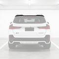 Gloss black rear roof spoiler wing installed on a 2023 BMW X1 U11