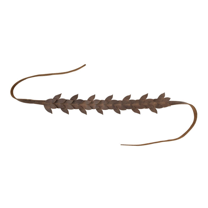 A flat view of Heather's Flowered Headband, this rustic headband features a unique leather floral design. Perfect for women looking for a fashionable hairband or headpiece. With its artisan craftsmanship, this full grain leather crown symbolizes small batch production and handmade quality from La Antigua Guatemala.