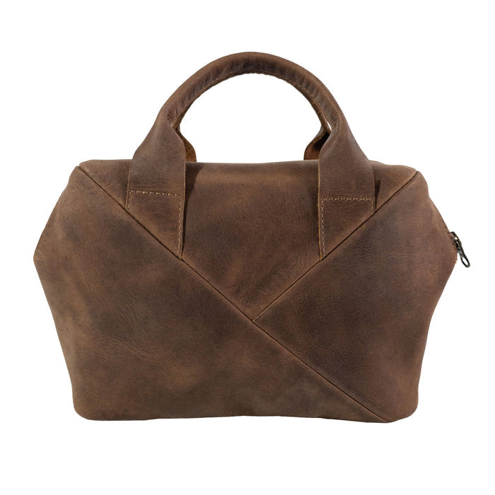 Stylish back view of Heather's Fluffy Purse showcasing its unique Full Grain Leather texture. As a Leather Fluffy Purse, it doubles as an efficient Handbag for Women and a trendy Night Bag, along with being a Rectangular Purse with Zipper. This bag features exquisite craftsmanship from Small Batch Production with Hand Cut and Hand Sewn details, Fire Branded, and proudly Handmade in La Antigua Guatemala & Oaxaca Mexico.