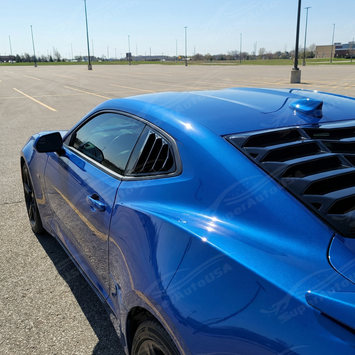Uninstalled gloss black rear window louver showing the lightweight one-piece design