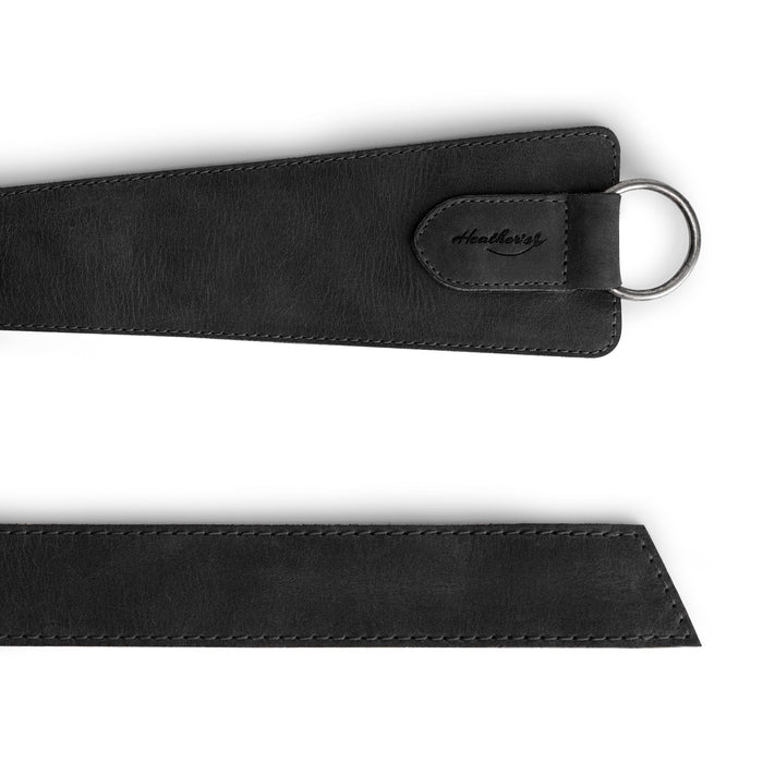 Close-up of Heather's Formal Belt for Women with Ring in black, featuring a streamlined design. Perfect as a belly accessory, this Full Grain Leather waist strap emphasizes the quality of small batch artisan craftsmanship in La Antigua Guatemala.