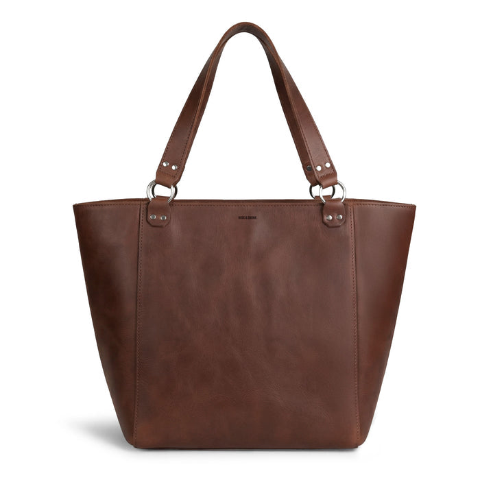 Front view of the stylish Leather Formal Handbag by Hide & Drink, made from premium Full Grain Leather. This beautiful bag serves multiple purposes as a Female Formal Handbag, Shoulder Bag, or Shopping Bag for girls. Handmade in La Antigua Guatemala & Oaxaca Mexico.