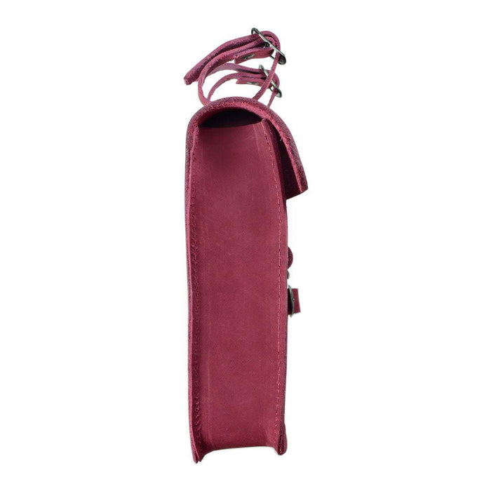 Side view of Hide & Drink's red Frame Bag For Bicycle showcasing its durable leather structure and craftsmanship. This stylish accessory is perfect for storing essential repair tools, handmade in La Antigua Guatemala & Oaxaca Mexico.