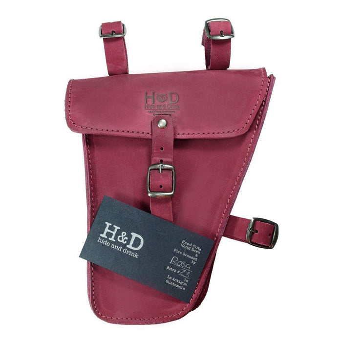 Hide & Drink's red Frame Bag For Bicycle against a clean background, highlighting its craftsmanship and functionality. This Full Grain Leather bag serves as a durable bike tool pouch, built for organizing biker essentials, handmade in La Antigua Guatemala & Oaxaca Mexico.
