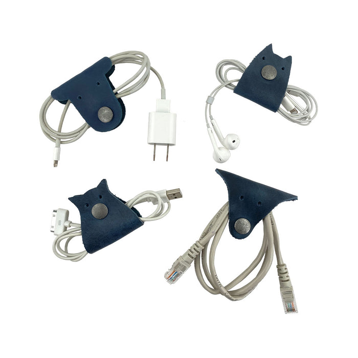 Furry Friends Cord Keeper (4-Pack) with charming designs to manage cords, expertly crafted from full grain leather by Hide & Drink. Furry Friends 4-Pack Cord Keeper (Cord Clam), Full Grain Leather, StockyardX, Small Batch Production, Hand Cut, Hand Sewn, Fire Branded, Artisan, Handmade in La Antigua Guatemala & Oaxaca Mexico.