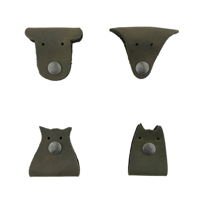 Furry Friends Cord Keeper (4-Pack) with adorable animal designs, crafted from Full Grain Leather by Hide & Drink, ideal for keeping cords tidy and organized. Furry Friends 4-Pack Cord Keeper (Cord Clam), Full Grain Leather, StockyardX, Small Batch Production, Hand Cut, Hand Sewn, Fire Branded, Artisan, Handmade in La Antigua Guatemala & Oaxaca Mexico.