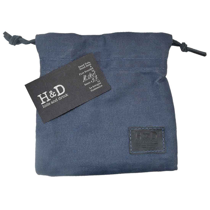 Hide & Drink Golf Pouch in sleek black color, perfect for organizational purposes during outings. Made from durable waxed canvas, it's a must-have for golfers and collectors alike. Waxed Canvas Golf Valuables Field Pouch, Golf Bag, Sport Organizer, Multipurpose Pouch with String, StockyardX, Small Batch Production, Hand Cut, Hand Sewn, Fire Branded, Artisan, Handmade in La Antigua Guatemala & Oaxaca Mexico.