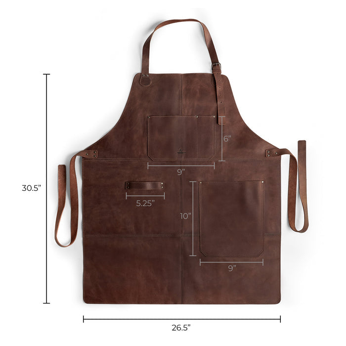 Dimensions of the Grill Apron by Cast Leather Co., designed for both style and safety, serving as an effective Protective Clothing Cover for Cooking and Grilling. Made from durable Heat Resistant Full Grain Leather, this apron is a must-have for your kitchen. A Handmade piece from La Antigua Guatemala & Oaxaca Mexico, crafted through Small Batch Production with Hand Cut and Hand Sewn techniques.