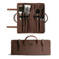 Cast Leather Co. Grill Tool Holder (Tools NOT included) showcasing a stylish carry bag for BBQ grilling accessories. This Grill Tools Set Case is crafted from full grain leather and waxed canvas, perfect for camping set storage for outdoor grilling enthusiasts. Hand cut, hand sewn, and fire branded, this artisan product embodies small batch production made in La Antigua Guatemala and Oaxaca Mexico.