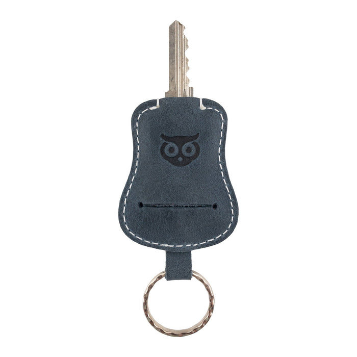 Guitar Keychain by Hide & Drink displaying its versatility and design, perfect for everyday key carrying. Handmade from durable Full Grain Leather, this keyring exemplifies artisan craftsmanship from small batch production in La Antigua Guatemala & Oaxaca Mexico.