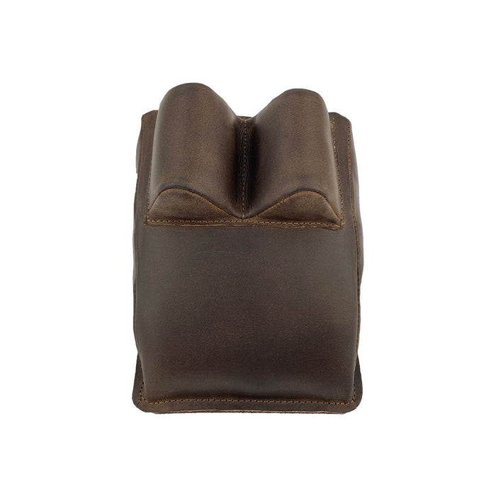 Hide & Drink Guitar Neck Rest featuring a sleek design perfect for maintenance of string instruments, made of premium full grain leather. Ideal for guitarists and musicians, it offers support during string changing, repair, and cleaning, emphasizing artisan qualities from small batch production in La Antigua Guatemala & Oaxaca Mexico.