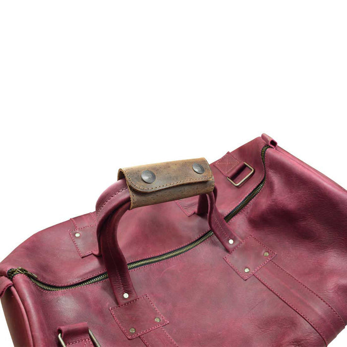 A close-up view of a rustic leather Handle Grip Replacement by Hide & Drink, showcasing its classic design perfect for luggage bags. Made from Full Grain Leather, this artisan-crafted accessory adds a stylish touch to travel gear while ensuring durability. Suitable for anyone looking for a high-quality Handle Grip Replacement for Luggage Bags, Travel Accessories, Full Grain Leather.