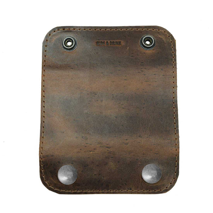 A distinctive angle of the Hide & Drink Handle Grip Replacement, focusing on its practical design for everyday travel needs. Made from Full Grain Leather, it is a premium accessory that captures the essence of artisan craftsmanship, perfect as a Handle Grip Replacement.