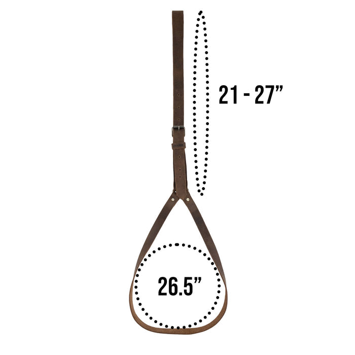Dimensions of the Hat Hanger by Hide & Drink displayed prominently, showing its adjustable size. This minimalist travel accessory is made of full grain leather, ensuring durability and style while promoting small batch production and artisan craftsmanship from La Antigua Guatemala & Oaxaca Mexico.