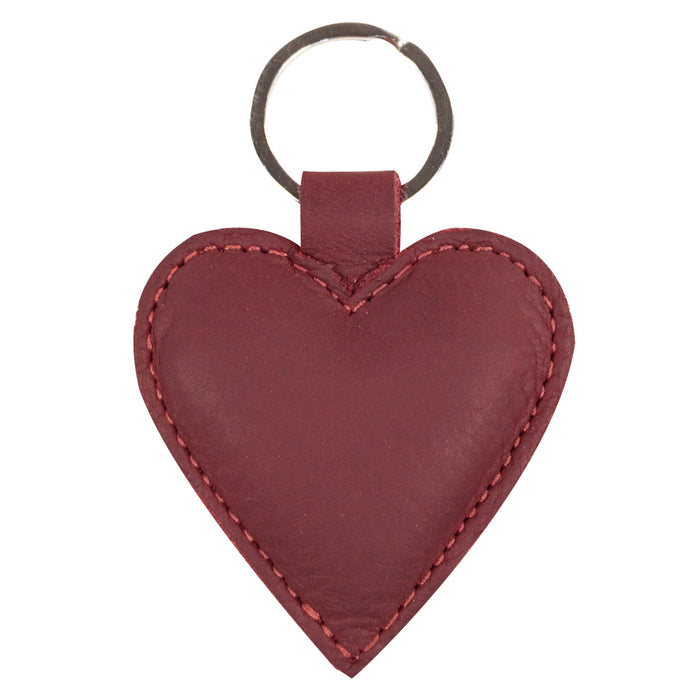 The front of a Heart Keychain by Hide & Drink, highlighting its beautiful heart-shaped design. This small batch produced keyring holder is made from high-quality Full Grain Leather, ensuring durability and style. Handmade in La Antigua Guatemala & Oaxaca Mexico, this cute accessory is perfect for organizing your keys with flair.