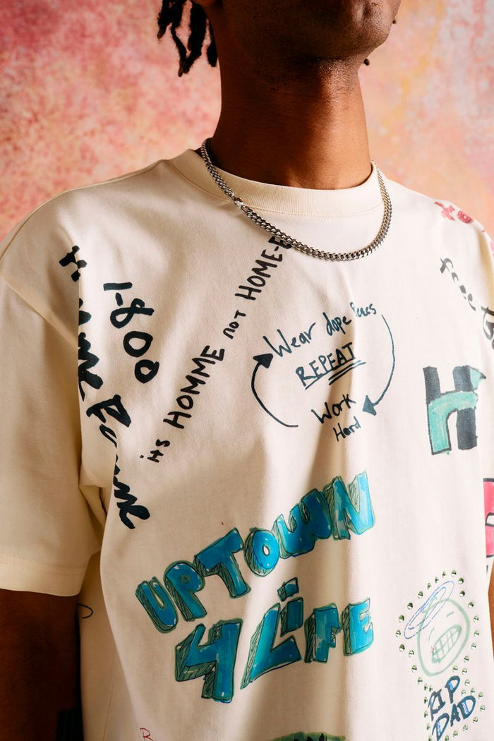 Standard fit Rest Stop tee with detailed graffiti-style designs on soft cotton fabric