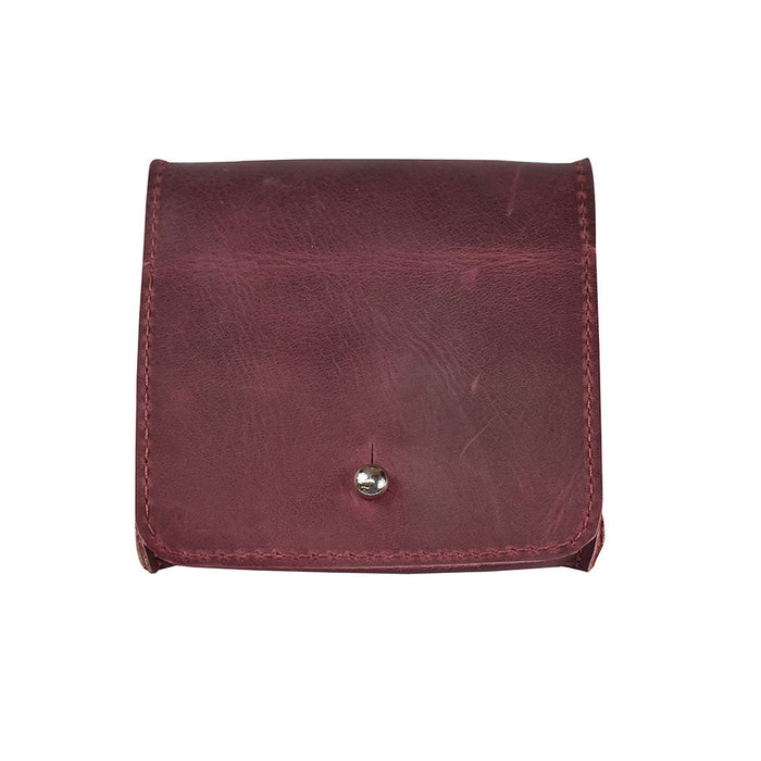 External view of a Hide & Drink Jewelry Pouch demonstrating its stylish full grain leather finish, well-designed for organizing precious articles. An ideal gift for weddings.