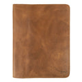 A thoughtful view of the Journal Cover for (8.5 x 11 in.) Moleskine Cahier XXL by Hide & Drink, emphasizing its handcrafted design and rich leather texture. Perfect as a genuine protector for your journal, artisan-crafted in La Antigua Guatemala & Oaxaca Mexico.