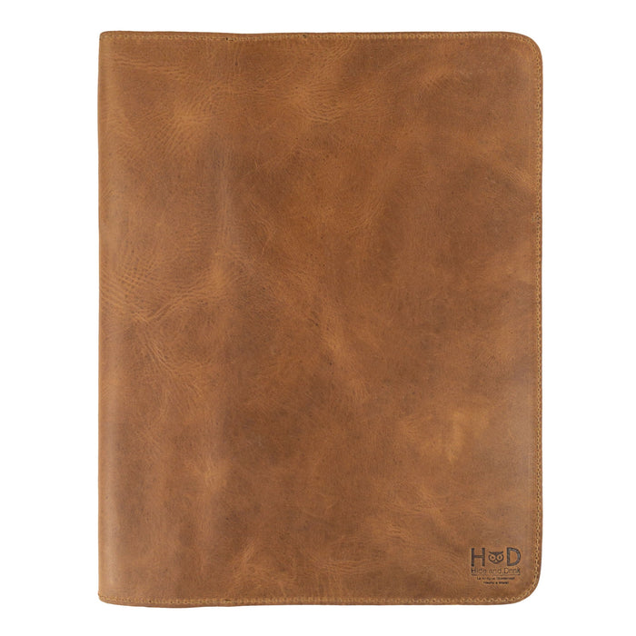 A thoughtful view of the Journal Cover for (8.5 x 11 in.) Moleskine Cahier XXL by Hide & Drink, emphasizing its handcrafted design and rich leather texture. Perfect as a genuine protector for your journal, artisan-crafted in La Antigua Guatemala & Oaxaca Mexico.