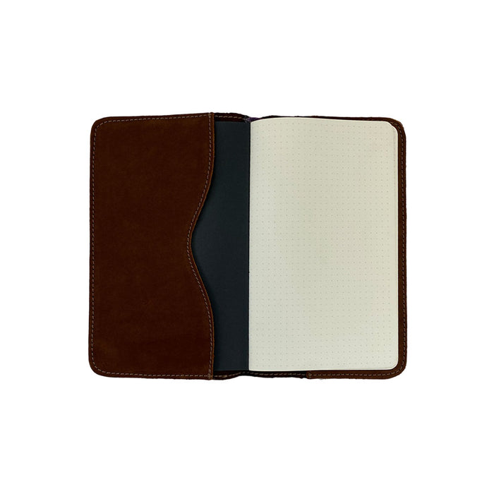Front view of an artisan brown Journal Cover for Moleskine Cahier L (5 x 8.25 in.) by Hide & Drink. This refillable protector, suitable for large size (5 x 8.25 in.) notebooks, beautifully highlights the quality of full grain leather.