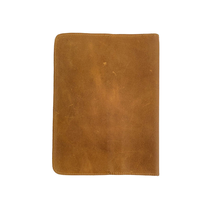 Front view of the eye-catching patchwork leather Full Grain Leather Journal Cover for Moleskine Cahier XL (7.5 x 9.75 in.) by Hide & Drink, featuring vibrant design and durable construction. Artfully crafted for individual style.