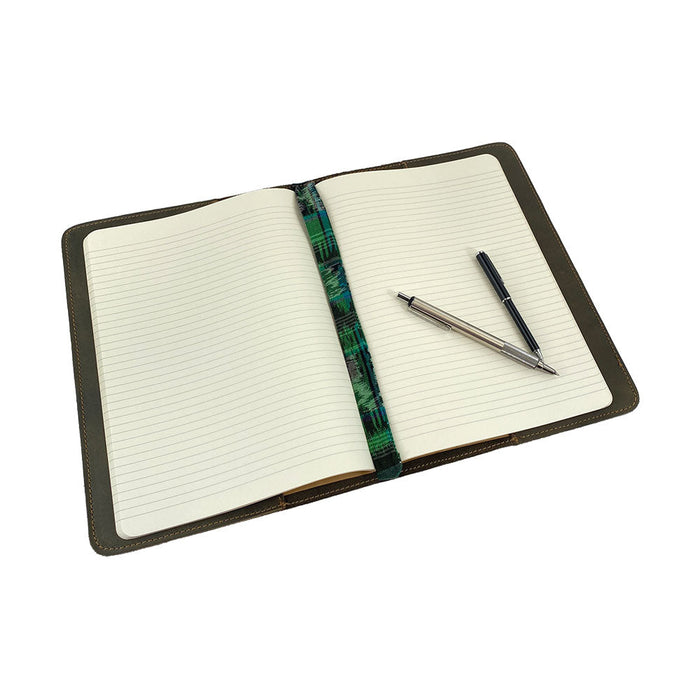 Front view of the olive green Full Grain Leather Journal Cover for Moleskine Cahier XL (7.5 x 9.75 in.) by Hide & Drink. This striking design offers a blend of robustness and style, ideal for writers who appreciate handcrafted journal cases.