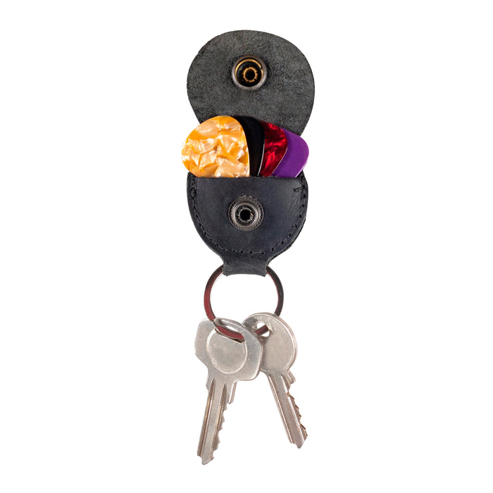 Hide & Drink Key Chain & Guitar Pick Holder, with a detailed view showcasing functional guitar pick storage. This artisan keychain made of Full Grain Leather is tailored for guitar players, emphasizing handmade qualities from La Antigua Guatemala & Oaxaca Mexico.