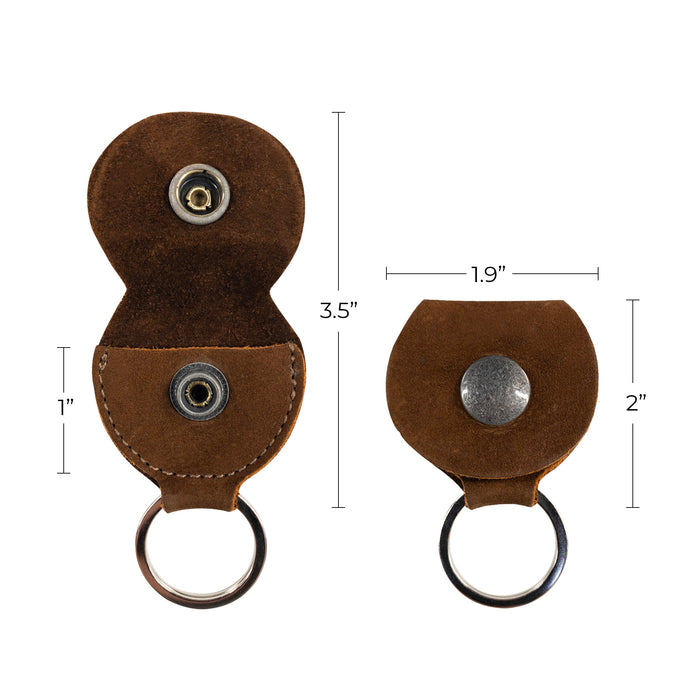 Dimensions of the Key Chain & Guitar Pick Holder by Hide & Drink, illustrating the size of the Guitar Pick Holder with Ring. This compact key organizer is made from Full Grain Leather, emphasizing small batch production quality with hand cut and hand sewn techniques, fire branded, and artisan crafted, handmade in La Antigua Guatemala & Oaxaca Mexico.