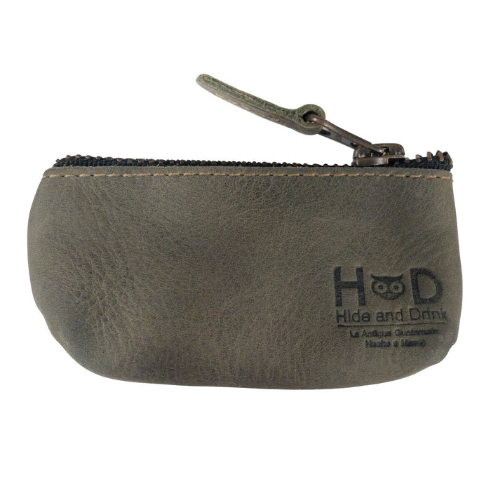Hide & Drink Key Holder Zippered Pouch with a vibrant navy color, highlighting its practical design for organizing small items such as coins and keys.