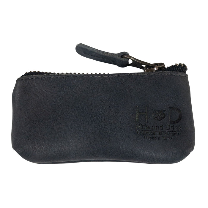 Hide & Drink Key Holder Zippered Pouch in a rustic brown hue, demonstrating vintage style craftsmanship. Ideal for keys, coins, or small memory cards, handmade in La Antigua Guatemala & Oaxaca Mexico.