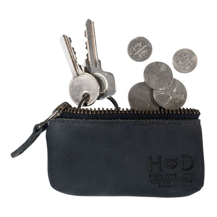 Hide & Drink Key Holder Zippered Pouch with keys and coins displayed, highlighting its practical design. Perfect as a money purse or as an earphone holder, crafted from full grain leather.