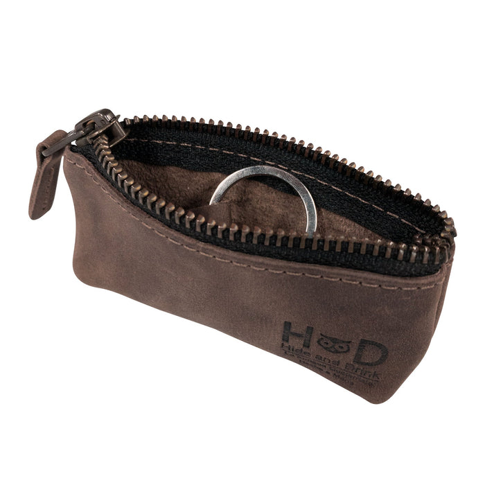 Hide & Drink Key Holder Zippered Pouch featuring an open view to organize keys or memory cards. Vintage style and designed to serve as a charging cable holder, beautifully crafted in full grain leather.