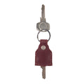 Hide & Drink Key Holder in rich burgundy leather, demonstrating exceptional craftsmanship. This stylish Key Holder serves as a Keychain Organizer and emergency coin pouch, an essential pocket accessory made from Full Grain Leather. Artisan-crafted in La Antigua Guatemala & Oaxaca Mexico.