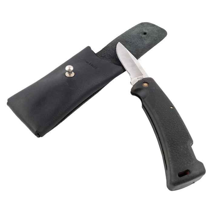 Hide & Drink Knife Case on display with a knife, made from premium black full grain leather. This handmade riveted Swiss knife case serves as both a protector and holster, essential for hiking and camping explorers, crafted in La Antigua Guatemala.