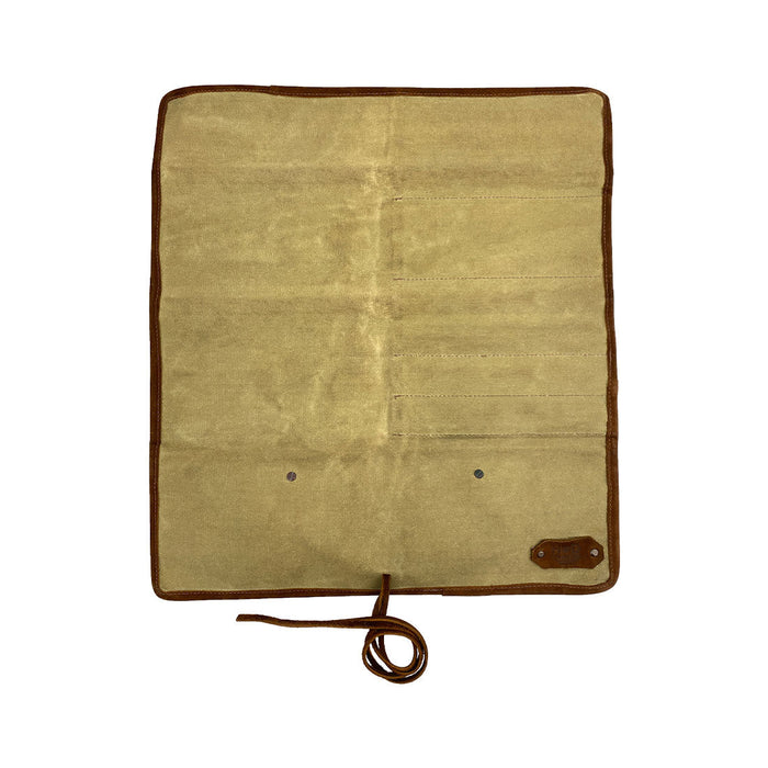 Hide & Drink Knife Roll (5 Pockets) displayed in detail, made from robust Full Grain Leather. This Chef Knife Bag serves as a portable carrying case for knives, highlighting craftsmanship through handmade quality from small batch production, which includes hand cut and hand sewn elements.