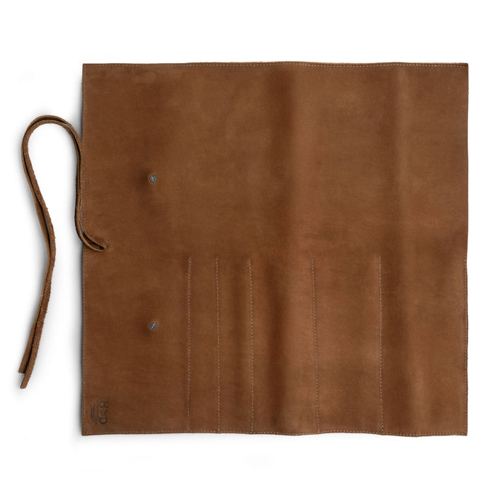 Hide & Drink Knife Roll (5 Pockets) opened to reveal its inner pockets made from durable Full Grain Leather. This Chef Knife Bag is a stylish portable carrying case for knives, benefiting from handmade techniques and small batch production done by skilled artisans in La Antigua Guatemala & Oaxaca Mexico.